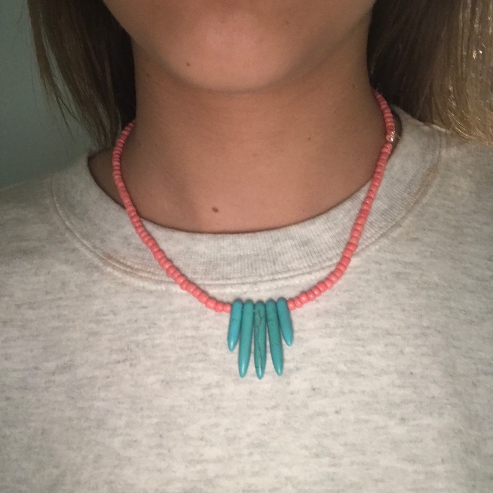coral beaded necklace with blue spikes