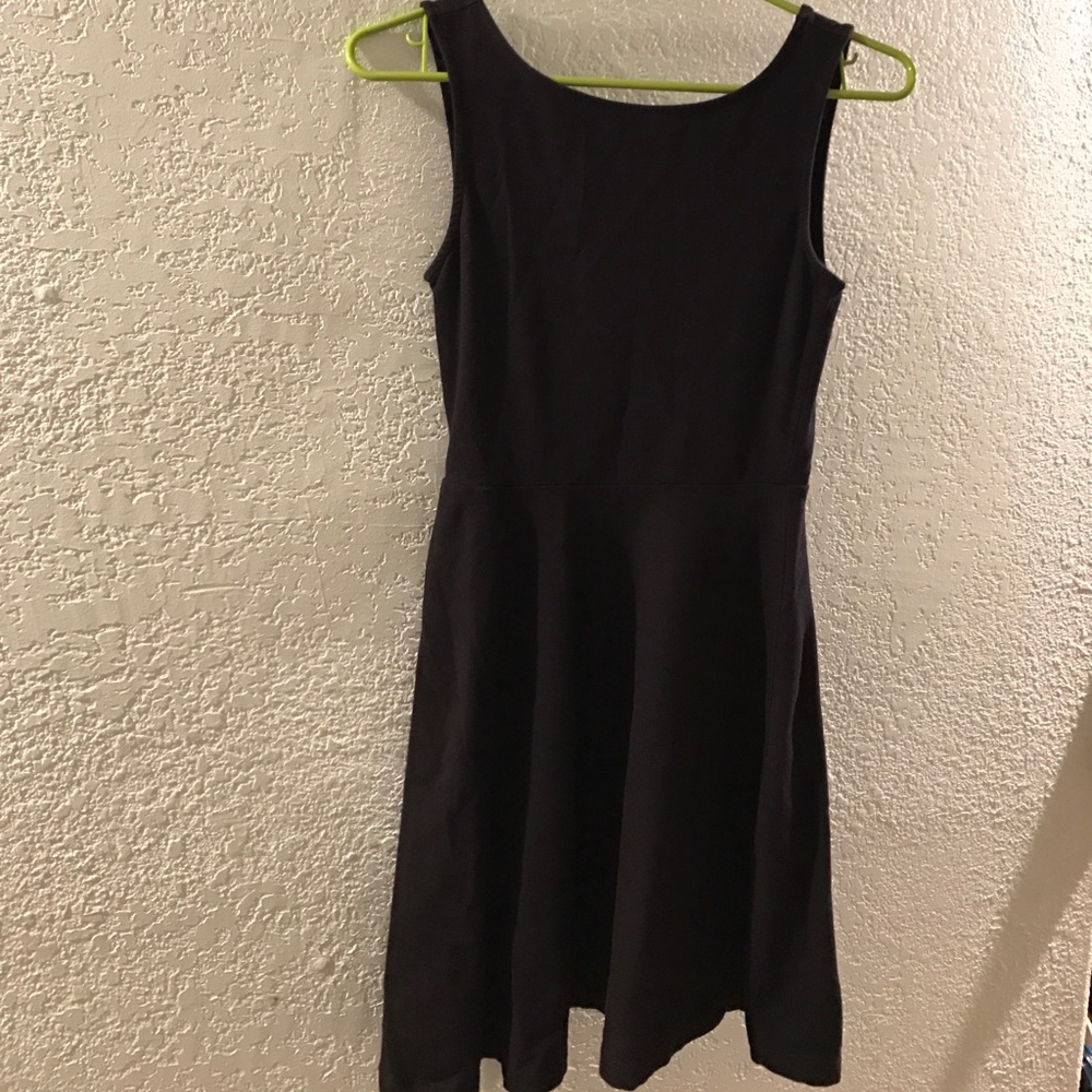 Sleeveless black skater dress