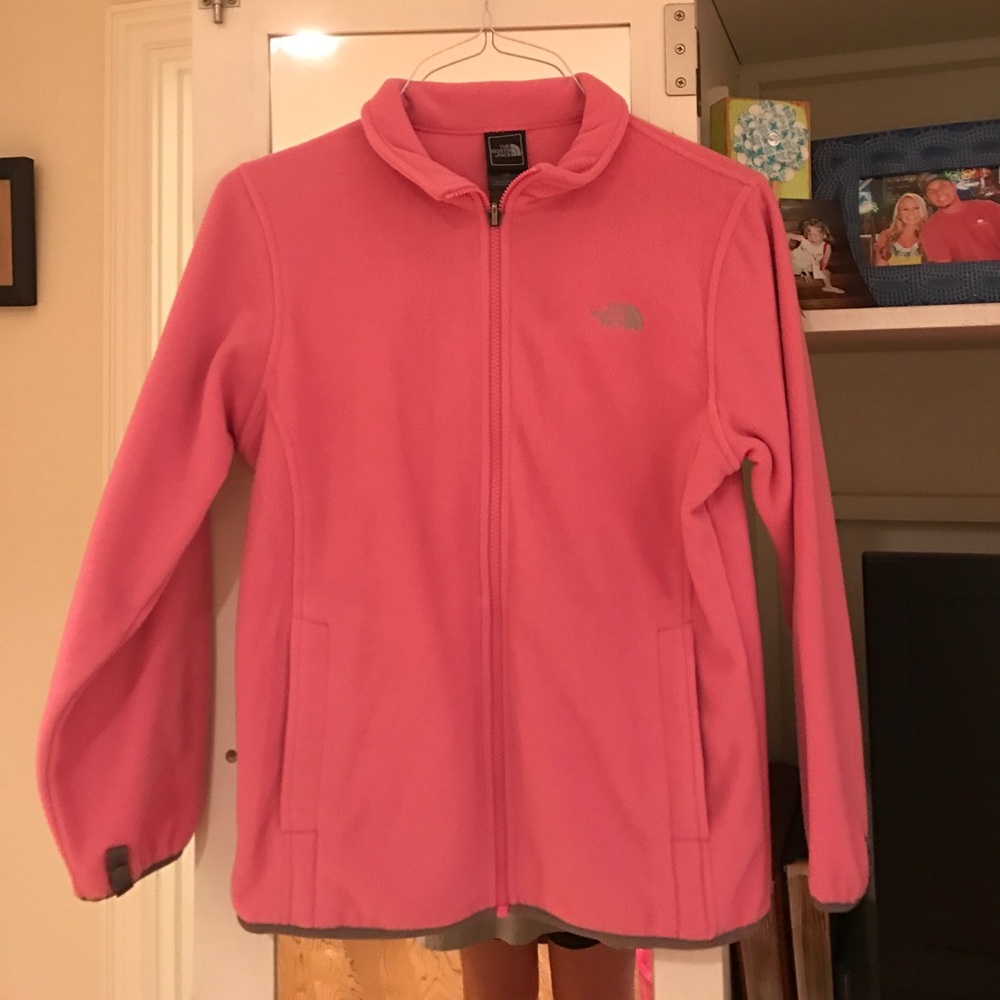 Kid size large never worn north face jacket