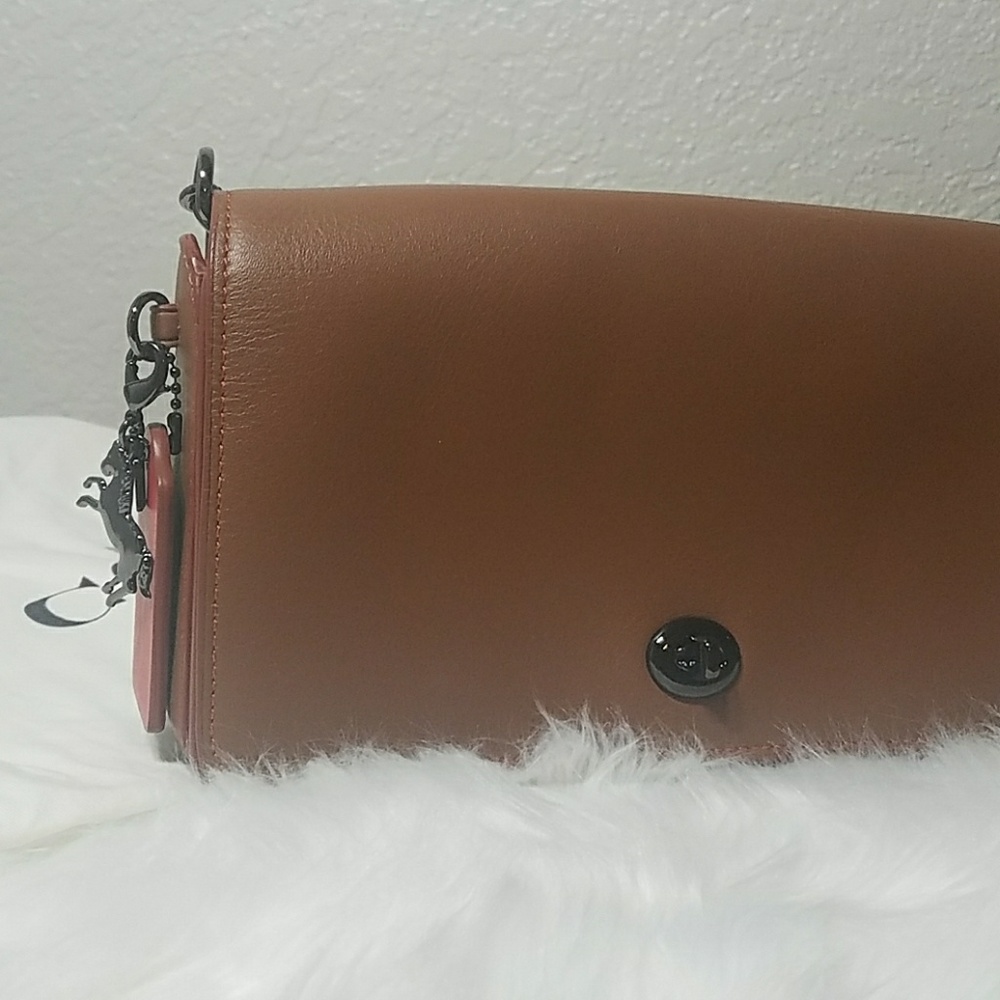 Coach dinky in Saddle tan with  horse charm