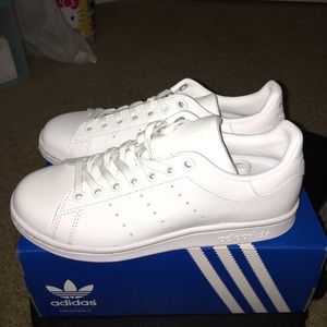 All white Adidas Stan Smiths