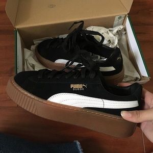 Puma black suede sneakers