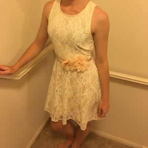 Cream Lacey dress with flower bow