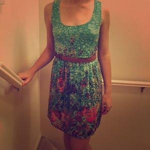 Green floral dress with brown braided belt