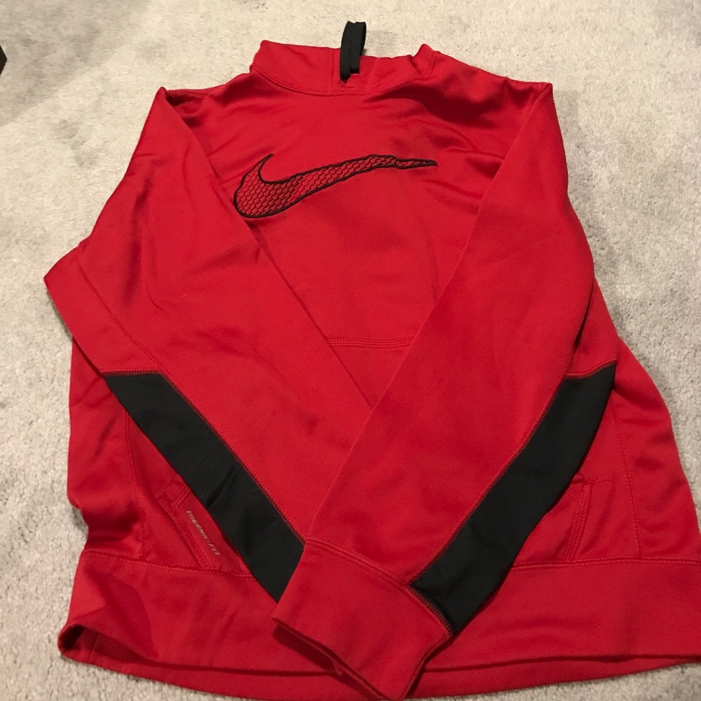 Red and Black Nike Thermafit hoodie.
