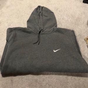Grey Nike hoodie.