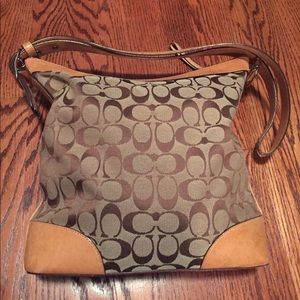 Brown and tan Coach boho bag.