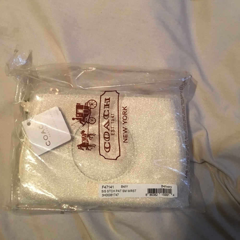 Small coach wristlet