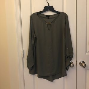 The limited green top with fold up sleeves