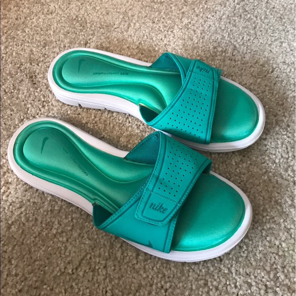 Teal/aqua nike slides with comfort footbed