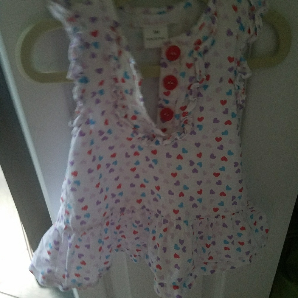 Girly ruffle dress with red buttons Eden + Esme