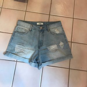 light wash blue denim high waisted shorts