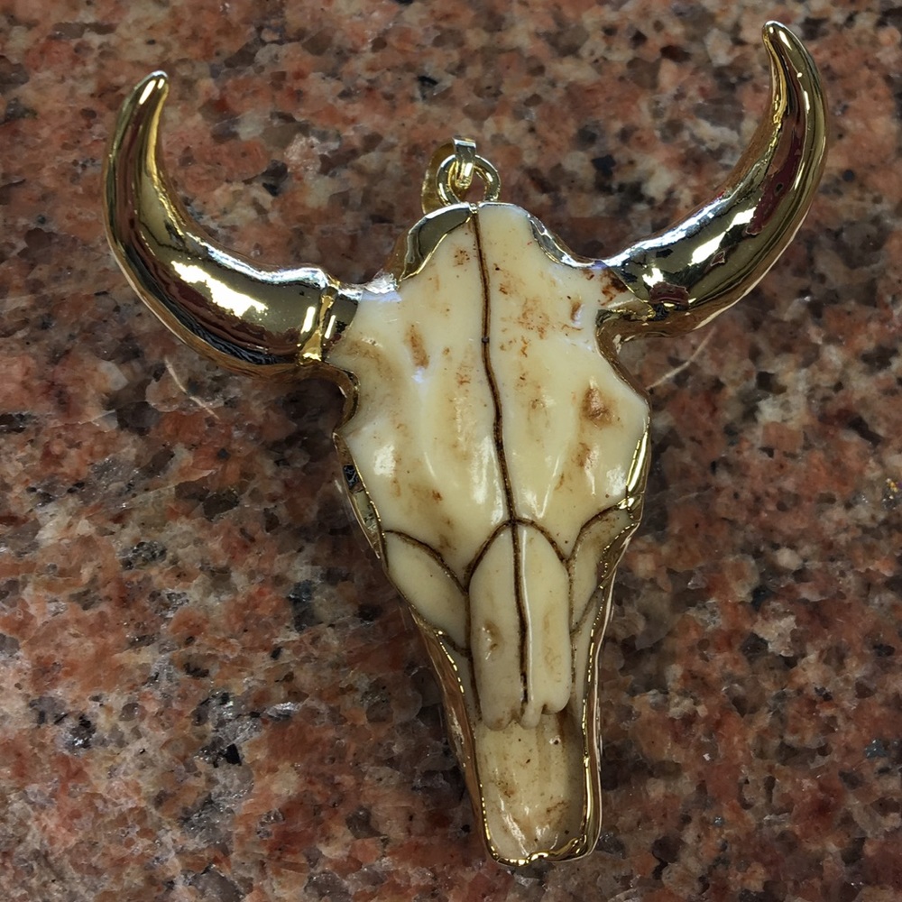 Gold resin buffalo skull pendant