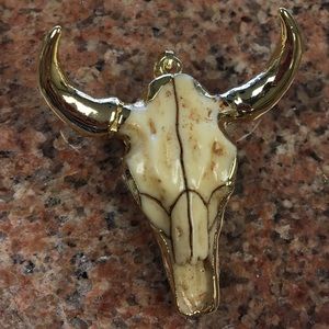 Gold resin buffalo skull pendant