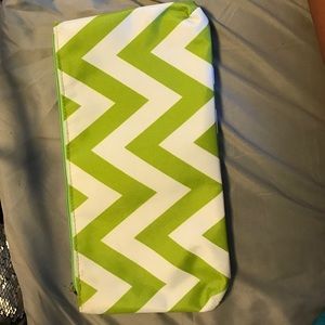 A green chevron cosmetic bag.