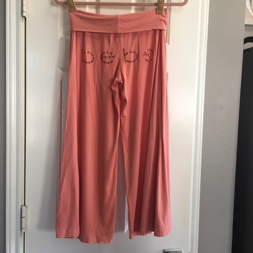 Bebe logo Capri swing pants with rhinestones.