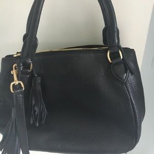 Black J.Crew purse with lots of pockets.