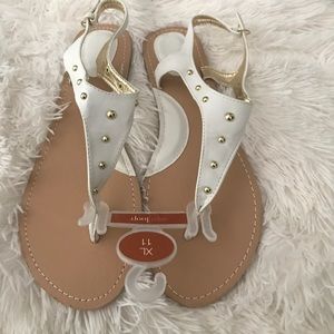 Cute white sandals with gold accent!