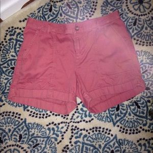 Distressed high waisted orange shorts