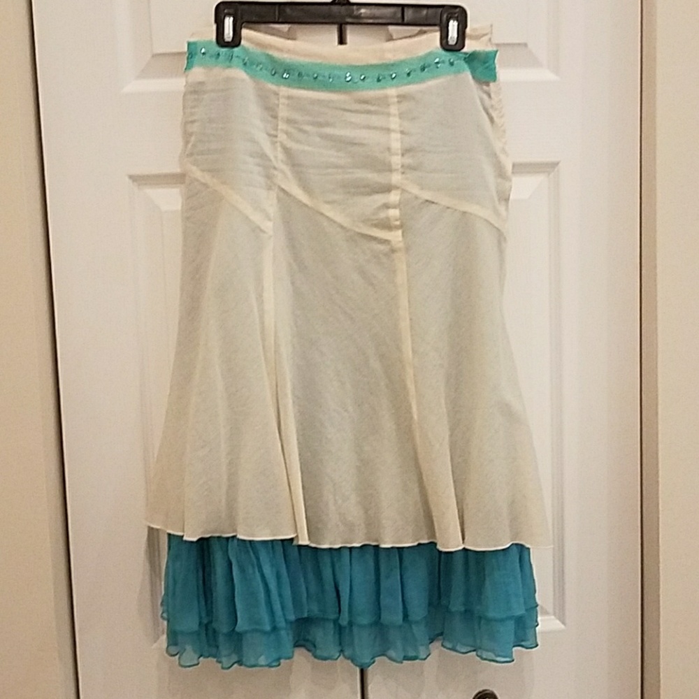Ruth  cream and blue color skirt,