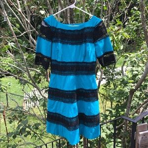 Beautiful turquoisedress with black lace details!