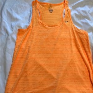 Nike Dri-Fit workout top. Never worn! Size medium.