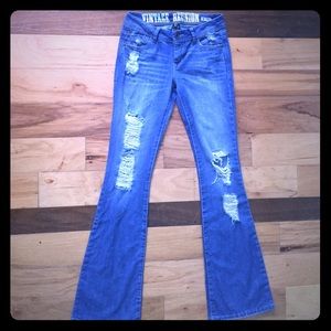 Women's VINTAGE REUNION distressed bell bottoms.