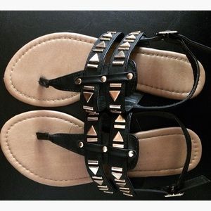 Black sandals with stylish metallic design