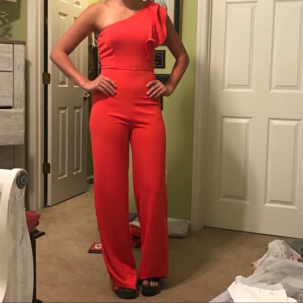 Orange One shoulder jump suit!