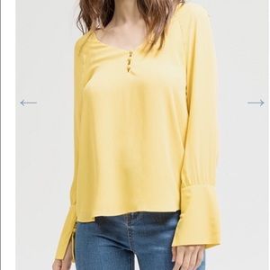 Yellow bell sleeve top
