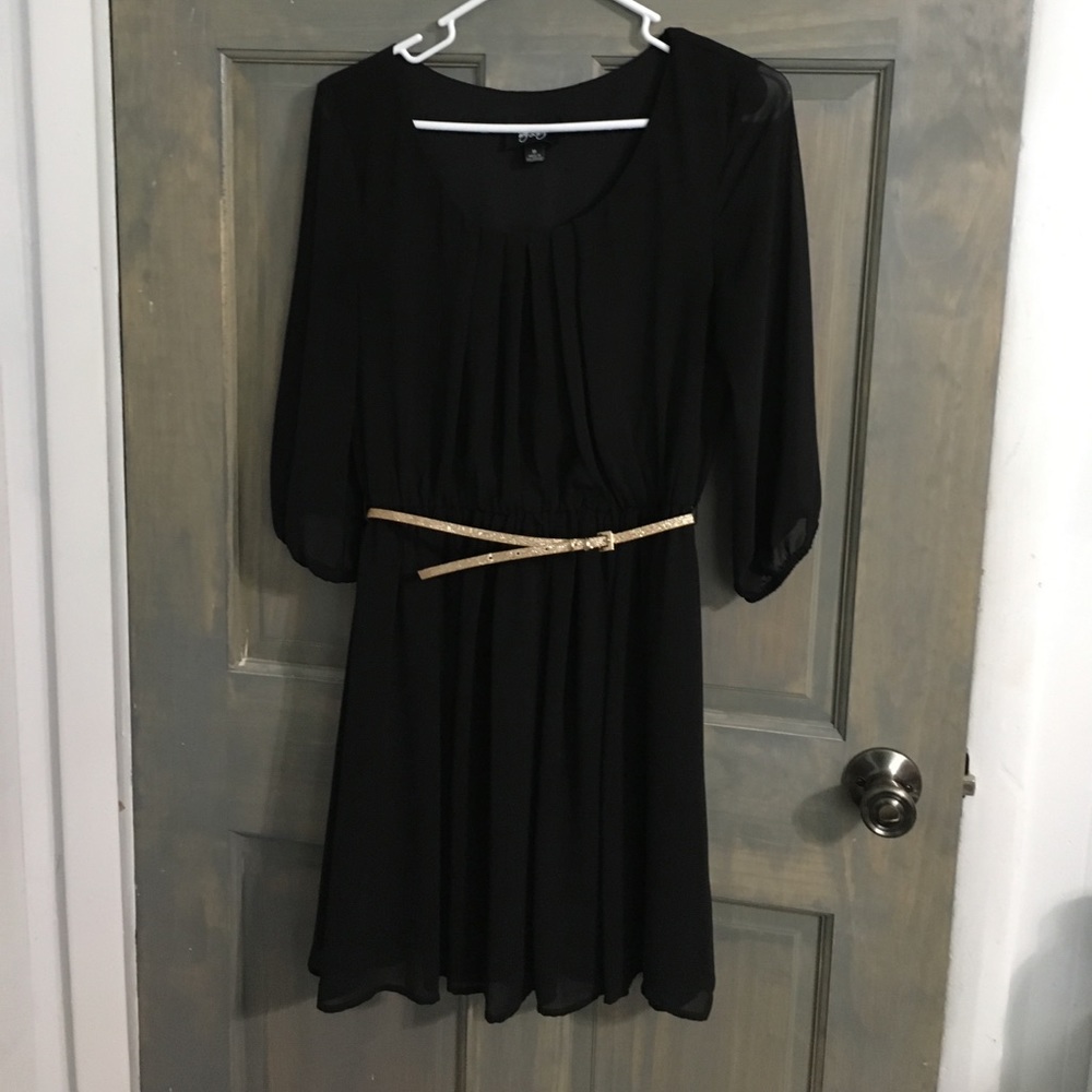 Little black dress with gold glitter belt.
