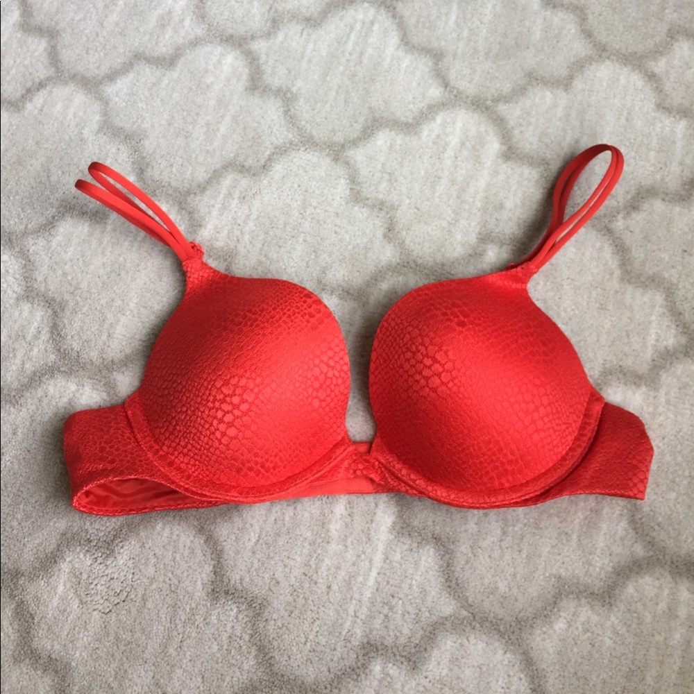 Victoria Secret very sexy plunge 34A orange padded