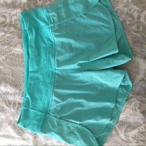 Turquoise Lulu Lemon shorts
