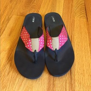 Pink polkadot flip flops in EUC