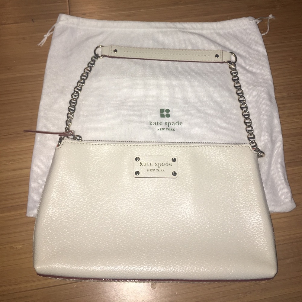 Kate Spade white wrist clutch with Dust bag