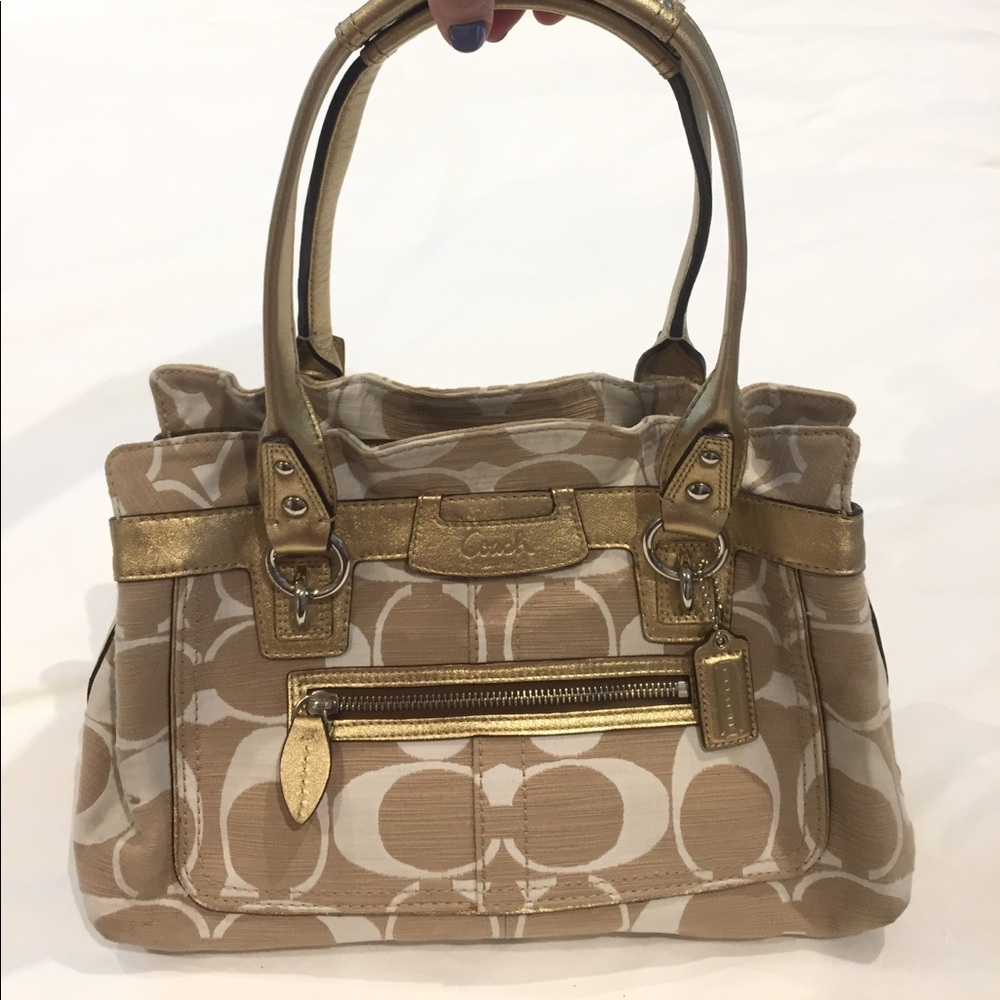 Coach purse with pockets and gold accents