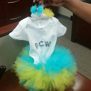 Tutu, onesie, and headband for baby