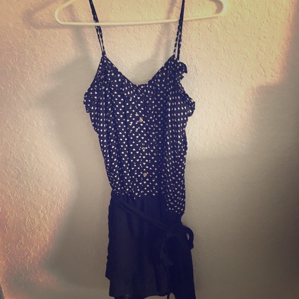 Navy romper with white heart pattern top