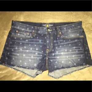 Lucky Brand cut off Stars & Stripes shorts.
