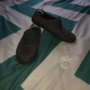 Dark gray vans with inserts in the back