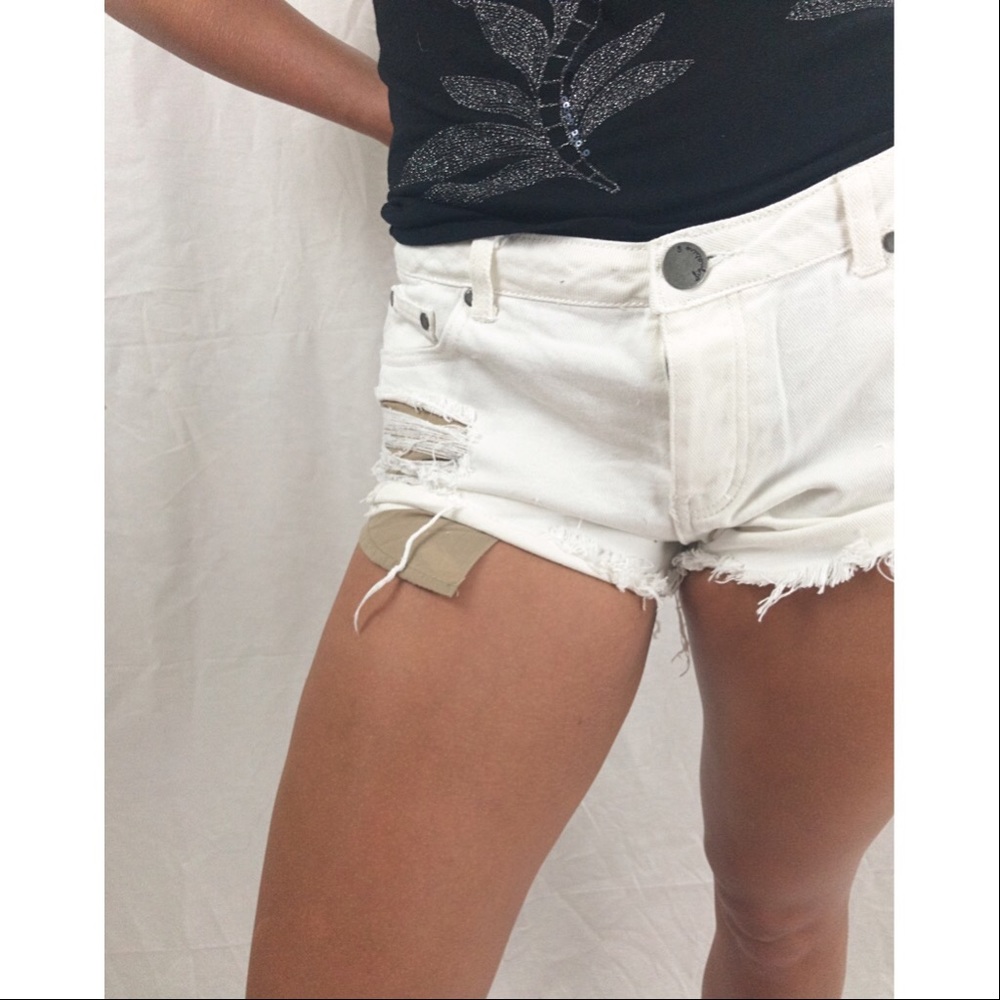 Ivory White Distressed Denim Shorts