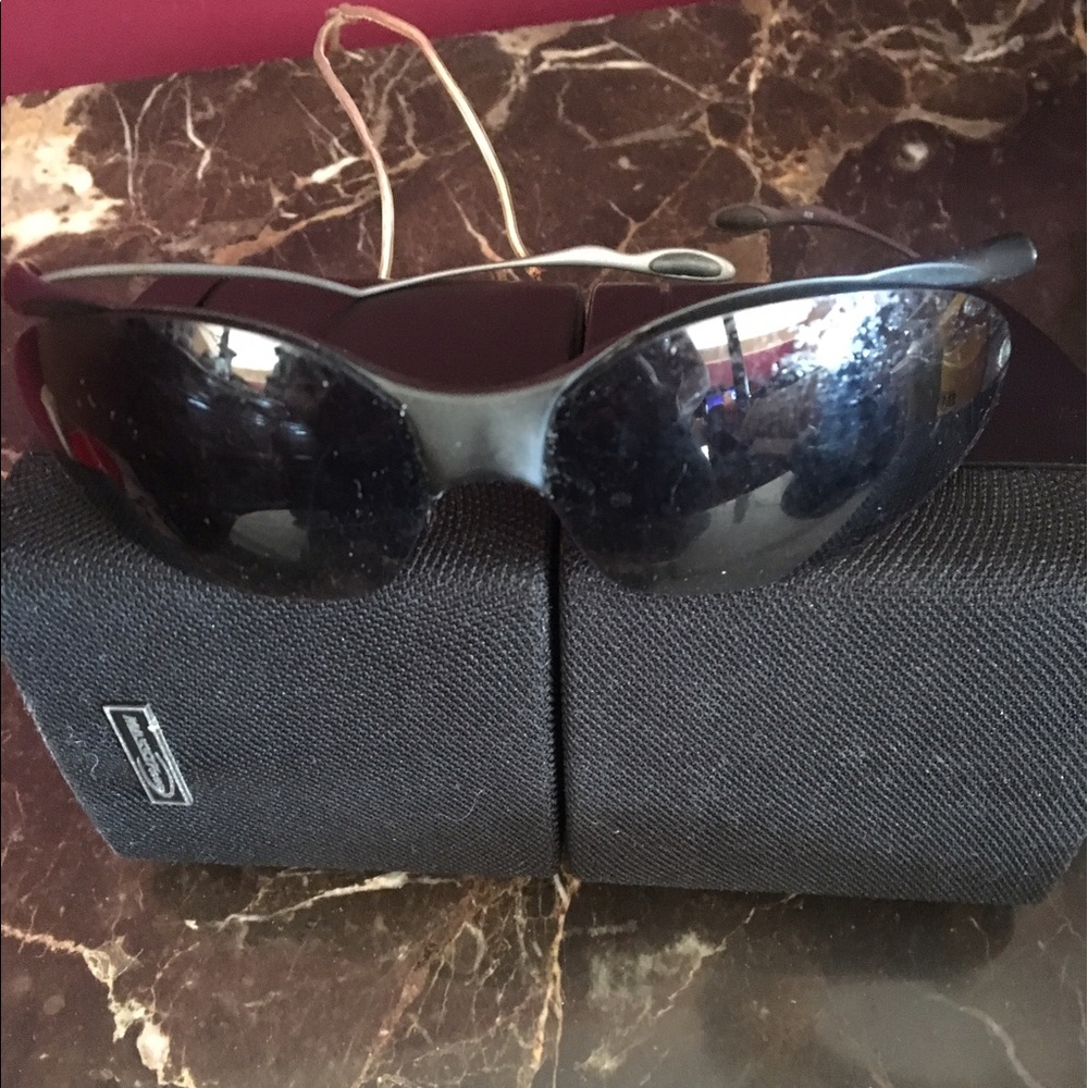 Nike sun Glass have a couple of scar on the Shield