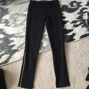 Black high wasted pants with gold ankle zipper