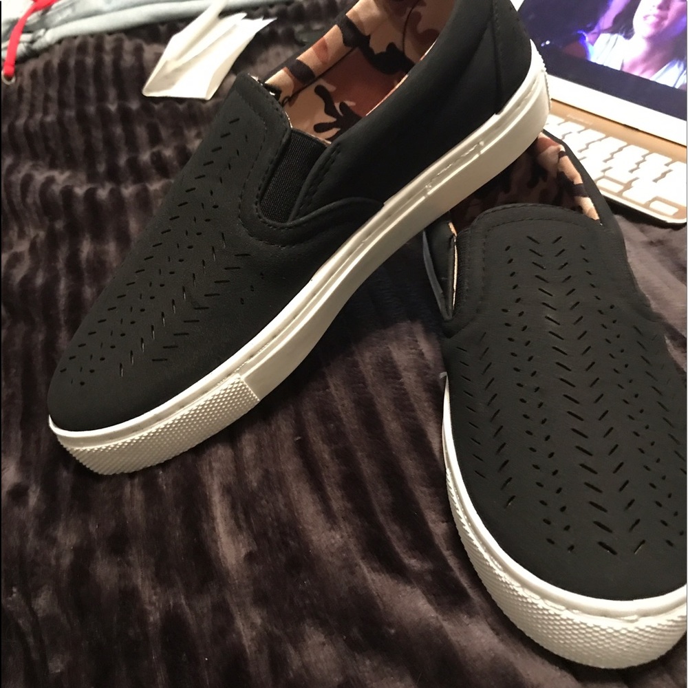 Black and white slip-on sneakers