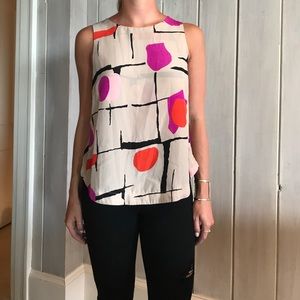 Boutique tank with cool open cut in the back