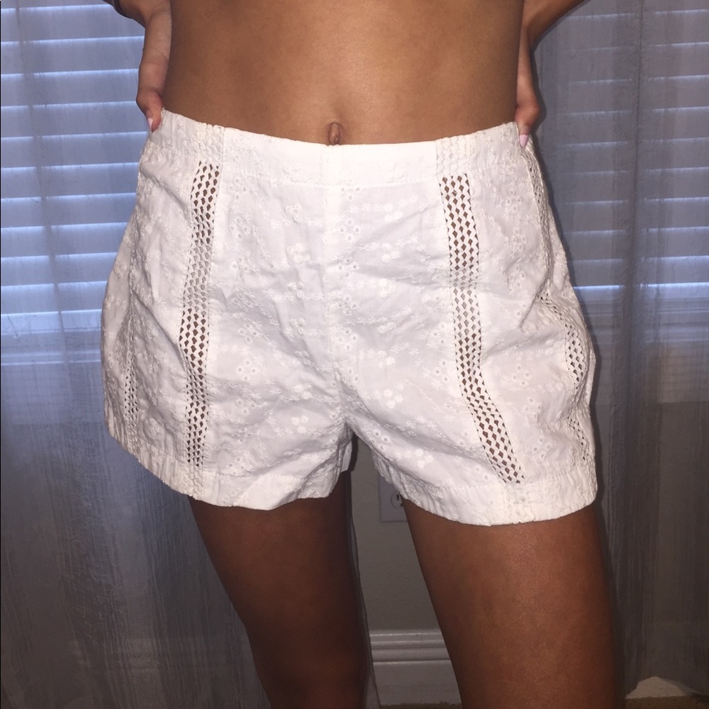 Floral patterned white shorts