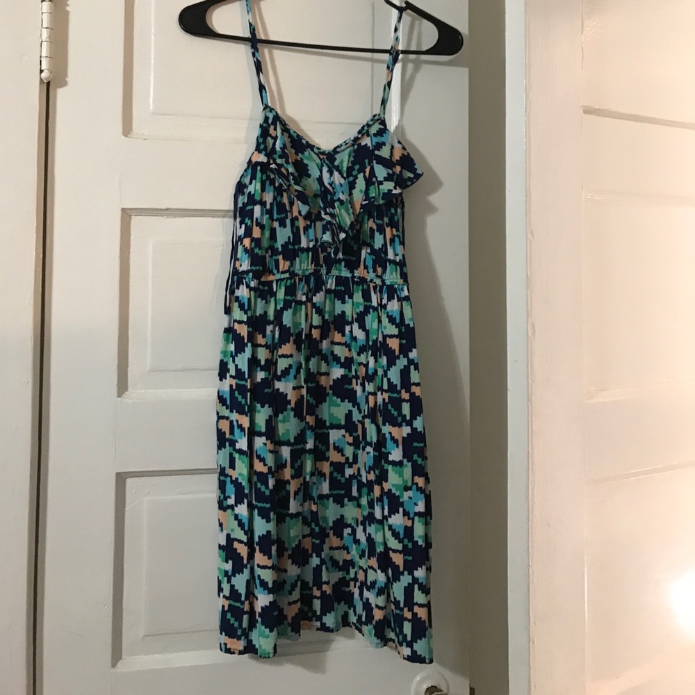 Multicolored dress with ruffle at top