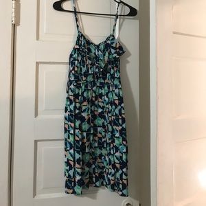 Multicolored dress with ruffle at top