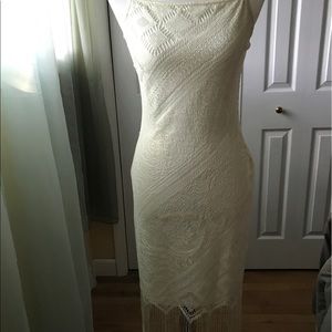 Delicate dress with delicate fringes.