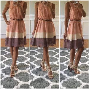 Flowy peach, cream, brown dress with belt. Sz S